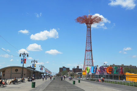 BROOKLYN, NEW YORK - JULY 30: Coney Island Boardwalk, parachute jump tower and restored historical...