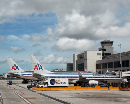 MIAMI, FLORIDA - JUNE 13  American Airlines planes at the gates on June 13, 2013 at Miami International airport American Airlines operates 274  flights every day from Miamiのeditorial素材