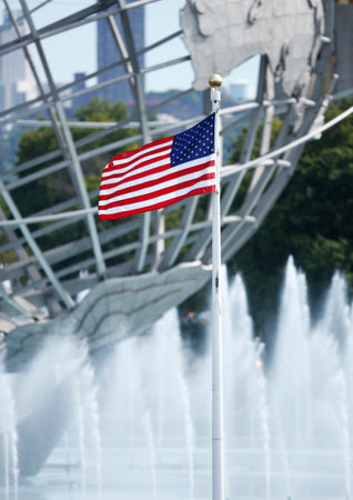 American flag in the front of 1964 New York World s Fair Unisphereのeditorial素材