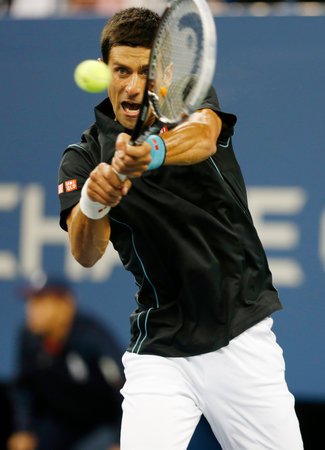 FLUSHING, NY - SEPTEMBER 5    Professional tennis player Novak Djokovic during  quarterfinal match at US Open 2013 against Mikhail Youzhny  at Billie Jean King National Tennis Center on September 5, 2013 in Flushing, NYのeditorial素材