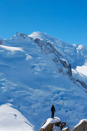 AUGUILLE DU MIDI, FRANCE -OCTOBER 9 Unidentified climbers instructor at the mountain top station of the Aiguille du Midi 3842 m in French Alps on October 9, 2013  Mont Blanc mountain at the backgroundのeditorial素材