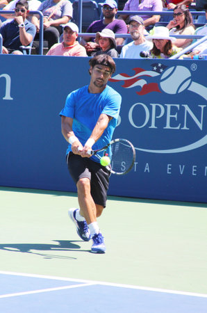 FLUSHING, NY - AUGUST 25   Professional tennis player Fabio Fognini from Italy practices for US Open 2013 at Billie Jean King National Tennis Center on August  25, 2013 in Flushing, NYのeditorial素材