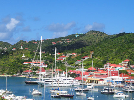 ST BARTS, FRENCH WEST INDIES - JANUARY 14  Gustavia Harbor with mega yachts on January 14, 2004 at St Barts  The island is popular tourist destination during the winter holiday season のeditorial素材