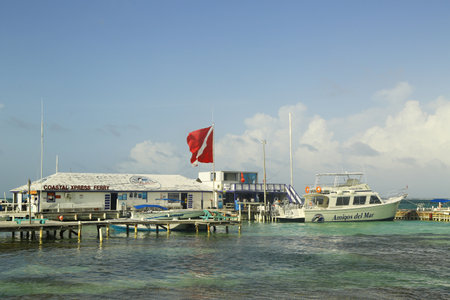 SAN PEDRO, BELIZE - JUNE 10  Boats at the Amigos del Mar Dock in San Pedro on June 10, 2013  San Pedro is a popular tourist destination at the island of Ambergris Caye in Belizeのeditorial素材
