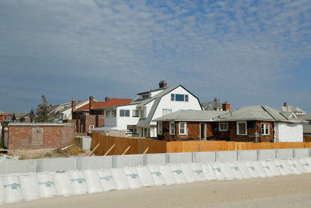 FAR ROCKAWAY, NY - OCTOBER 22  Damaged beach house in devastated area one year after Hurricane Sandy on October 22, 2013 in Far Rockaway, NY  Notice protective barrier build to prevent flooding のeditorial素材