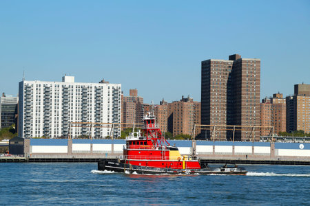 NEW YORK - OCTOBER 1  Tugboat Evening Mist in East River in New York on October 1, 2013  She is a twin screw rated at 3000 horsepower のeditorial素材
