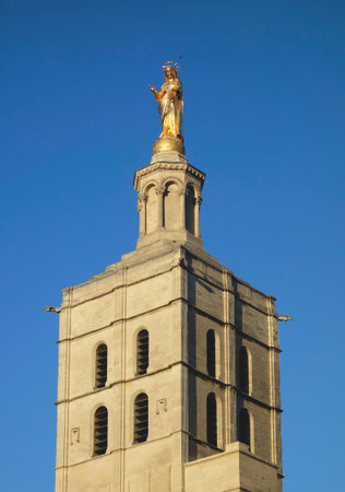 AVIGNON, FRANCE - OCTOBER 11 Gilded statue of Virgin Mary on top of Notre Dames des Domes Cathedral near Papal Palace in Avignon on October 11, 2013  Cathedral is the seat of the Archbishop of Avignonのeditorial素材
