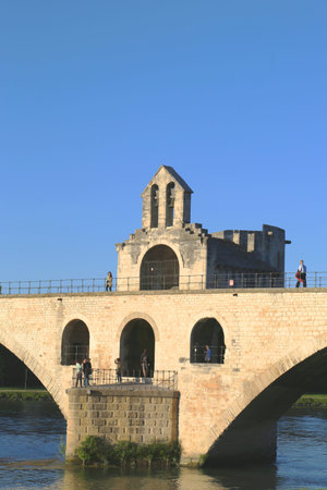 AVIGNON, FRANCE - OCTOBER 11  Chapel Saint Benezet on the bridge of Saint Benezet in Avignon on October 11, 2013  Famous medieval bridge was built between 1177 and 1185のeditorial素材
