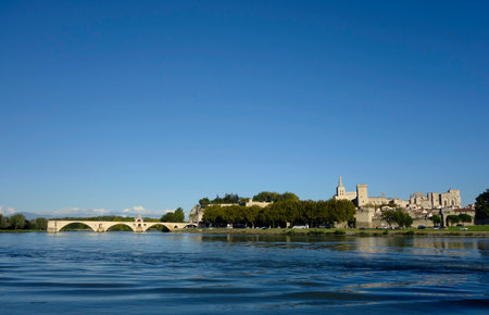 Panoramic view over the Rhone River with the Pont Saint-Benezet and medieval city of Avignon, Franceのeditorial素材