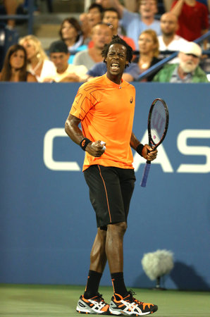 NEW YORK - AUGUST 29  Professional tennis player Gael Monfils during second round match at US Open 2013 against John Isner at Billie Jean King National Tennis Center on August 29, 2013 in New Yorkのeditorial素材