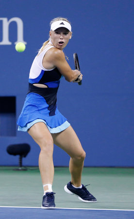 NEW YORK - AUGUST 31 Professional tennis player Caroline Wozniacki during third round match at US Open 2013 against Camila Giorgi at Billie Jean King National Tennis Center on August 31, 2013 in New Yorkのeditorial素材