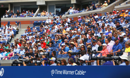 NEW YORK - SEPTEMBER 3 Professional photographers and spectators during US Open 2013 at the Arthur Ashe Stadium at Billie Jean King National Tennis Center on September 3, 2013 in New Yorkのeditorial素材