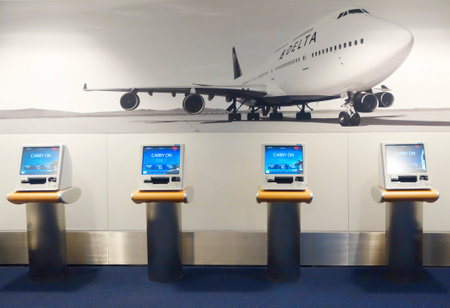 NEW YORK- DECEMBER 30  Delta Airlines self service kiosk in Terminal 4 at John F Kennedy International Airport on December 30, 2013  Delta Air Lines operates over 5,000 flights every day  のeditorial素材