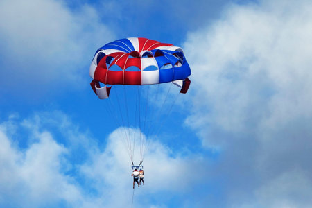 PUNTA CANA, DOMINICAN REPUBLIC - DECEMBER 30  Parasailing in a blue sky in Punta Cana on December...