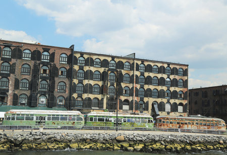 BROOKLYN, NY - AUGUST 17  Abandoned streetcars in the front of Fairway supermarket in Red Hook section in Brooklyn on August 17, 2013  Brooklyn City Street Car Company once operated themのeditorial素材