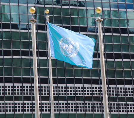  United Nations Flag in the front of UN Headquarter in New York