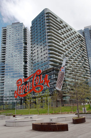 NEW YORK - MAY 6  Landmark Pepsi Cola sign in Long Island City on May 6, 2014  This historic 147 foot sign once on the Pepsi Factory is now located at Gantry Plaza State Park in Queensのeditorial素材
