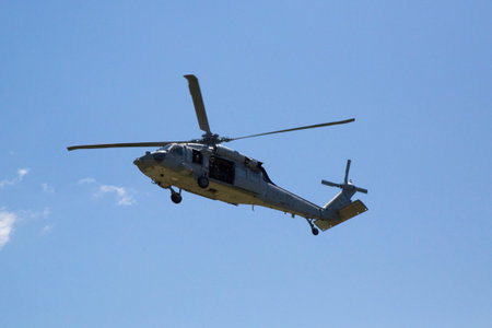 FREEPORT, NEW YORK - MAY 25  MH-60S helicopter from Helicopter Sea Combat Squadron Five with US Navy EOD team landing for mine countermeasures demonstration during Fleet Week 2014 on May 25, 2014のeditorial素材