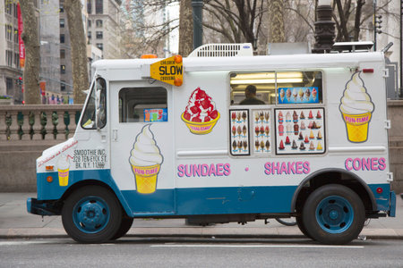 NEW YORK - APRIL 27  Ice cream truck in midtown Manhattan on April 27, 2014  Mister Softee is a United States-based ice cream truck franchisor popular in the Northeast founded in 1956のeditorial素材