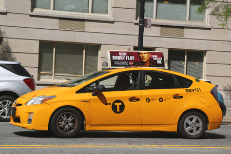 NEW YORK CITY - JUNE 5  New York City Taxi on June 5, 2014  New York City has around 6,000 hybrid taxis, representing almost 45 of the taxis in service, the most in any city in North Americaのeditorial素材