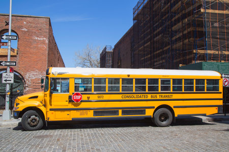 NEW YORK CITY- APRIL 24  School bus in Brooklyn on April 24, 2014  NYC has the largest school transportation department in the countryのeditorial素材