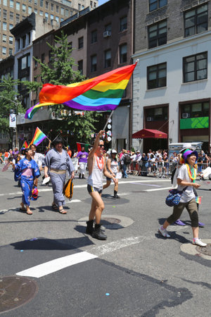 NEW YORK - June 29, 2014  LGBT Pride Parade participants in New York City on June 29, 2014  LGBT pride march takes place during pride week and is the culmination of week long festivitiesのeditorial素材