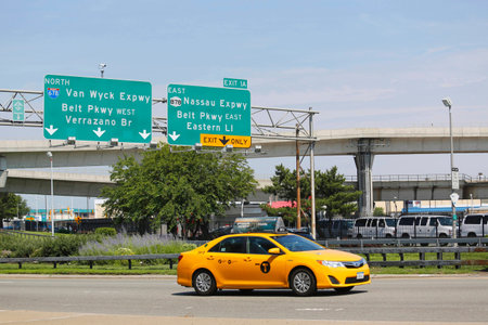 NEW YORK - JULY 10  New York Taxi at Van Wyck Expressway entering JFK International Airport in New...