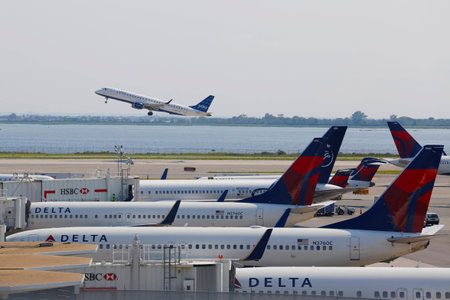 NEW YORK - JULY 10  JetBlue Embraer 190 taking off from JFK Airport in New York on July 10, 2014 ...