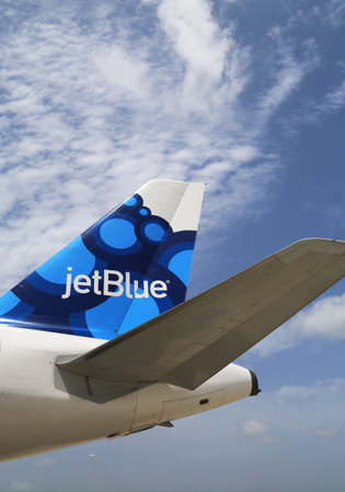 GRAND CAYMAN, CAYMAN ISLANDS - June 13  JetBlue Airbus A320 blueberries-inspired design tailfin  at...