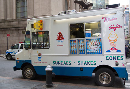 NEW YORK -APRIL 27  Ice cream truck in midtown Manhattan on April 27, 2014  Mister Softee is a United States-based ice cream truck franchisor popular in the Northeast founded in 1956のeditorial素材