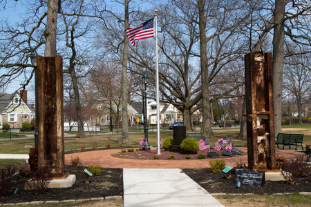 EAST ROCKAWAY, NEW YORK - APRIL 22: September 11 memorial with columns from World Trade Center site in East Rockway on April 22, 2014のeditorial素材
