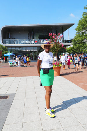 NEW YORK - AUGUST 26: US Open Ambassador welcomes visitors at Billie Jean King National Tennis Center on August 26, 2014 in New York. US Open is a final Grand Slam tournament of the yearのeditorial素材