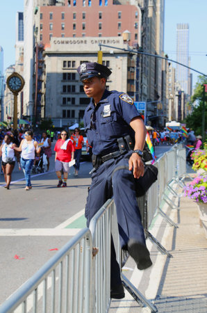 NEW YORK - JUNE 29: NYPD officer during LGBT Pride Parade in NY on June 29, 2014. LGBT pride march...