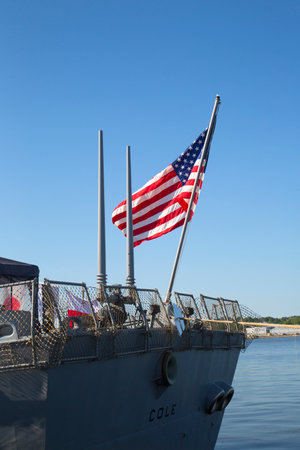 NEW YORK - MAY 25 American flag at the USS Cole guided missile destroyer of the United States Navy during Fleet Week 2014 on May 25, 2014 in New Yorkのeditorial素材