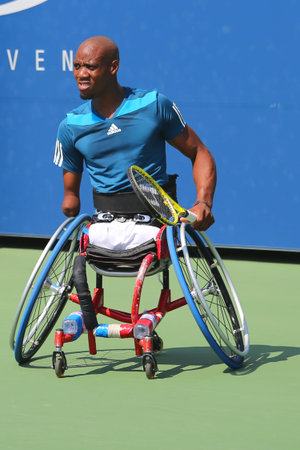 NEW YORK - SEPTEMBER 6 Tennis player Lucas Sithole from South Africa during US Open 2014 wheelchair quad singles match at Billie Jean King National Tennis Center on September 6, 2014 in New Yorkのeditorial素材