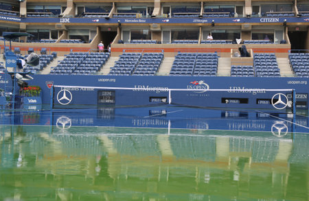 NEW YORK - AUGUST 31: Rain delay during US Open 2014 at Arthur Ashe Stadium at Billie Jean King National Tennis Center on August 31, 2014 in Flushing, NYのeditorial素材