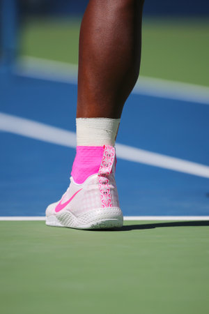 NEW YORK - AUGUST 28 Seventeen times Grand Slam champion Serena Williams wears custom Nike tennis shoes during match at US Open 2014 at Billie Jean King National Tennis Center on August 28, 2014 in NYのeditorial素材