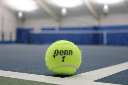 BROOKLYN, NY - OCTOBER 5: Penn tennis ball at indoor court in Brooklyn on October 5, 2014. Penn tennis balls produced by Head sports equipment and clothing company.のeditorial素材