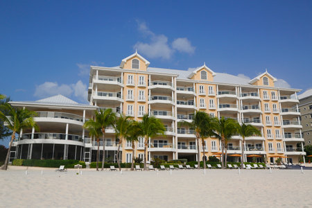 GRAND CAYMAN - JUNE 12: Luxury condominium located on the Seven Miles Beach at Grand Cayman on June 12, 2014. Seven Mile Beach is the most populated area for hotels and resorts on the islandのeditorial素材