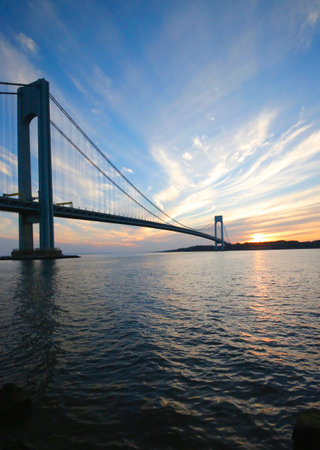 NEW YORK - NOVEMBER 9: Verrazano Bridge in New York on November 9, 2014.The Verrazano Bridge is a double-decked suspension bridge that connects the boroughs of Staten Island and Brooklynのeditorial素材