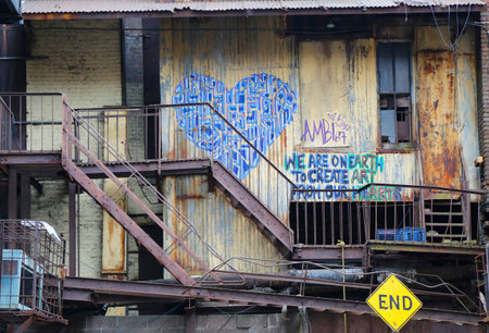 NEW YORK - NOVEMBER 13: Mural art at Grove Place in Downtown Brooklyn on November 13, 2014. A mural is any piece of artwork painted or applied directly on a wall, ceiling or other permanent surfaceのeditorial素材