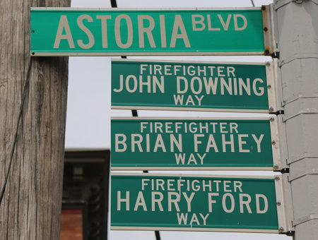 NEW YORK - JULY 24: Part of Astoria Boulevard bears the dedicated names of Firefighters John Downing, Brian Fahey, and Harry Ford,who were killed in fire and explosion in Astoria on July 24, 2014のeditorial素材