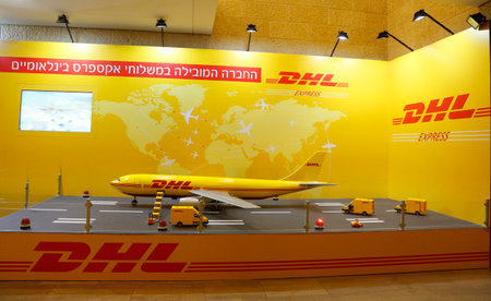 TEL AVIV, ISRAEL - NOVEMBER 28: DHL Express display in Ben Gurion International Airport in Tel Aviv on November 28, 2014.のeditorial素材