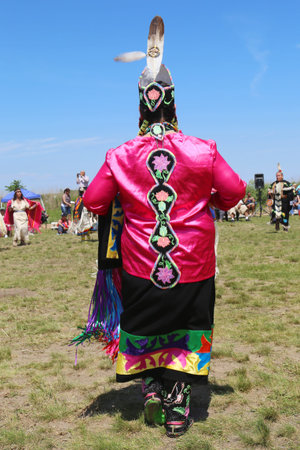 NEW YORK - JUNE 8:Unidentified female Native American dancer wears traditional Pow Wow dress during the NYC Pow Wow in Brooklyn on June 8, 2014のeditorial素材