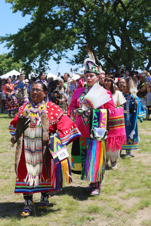 NEW YORK - JUNE 8: Unidentified Native American female dancers during NYC Pow Wow parade in Brooklyn on June 2, 2013. A pow-wow is a gathering and Heritage Celebration of North America s Native peopleのeditorial素材