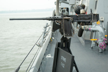 NEW YORK - MAY 22: .50-caliber machine gun aboard the guided-missile destroyer USS Cole during Fleet Week 2014 on May 22, 2014 in New Yorkのeditorial素材
