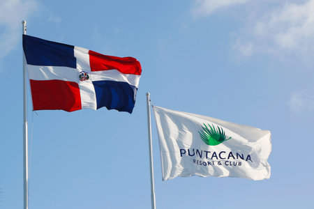 PUNTA CANA, DOMINICAN REPUBLIC - JANUARY 4, 2015: Dominican Republic and Punta Cana Resort and Club flags at Punta Cana Airport.のeditorial素材