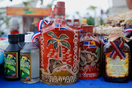 PUNTA CANA, DOMINICAN REPUBLIC - JANUARY 2, 2015:  Mamajuana souvenir bottles in Punta Cana. Mamajuana is a home made aphrodisiac drink made from medicinal roots in Dominican Republicのeditorial素材