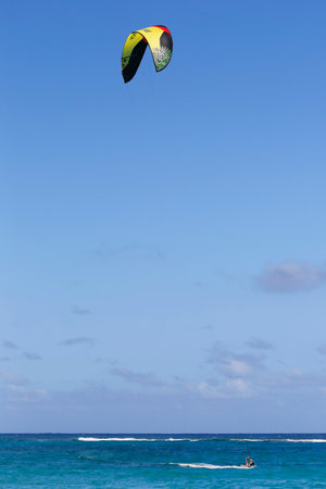 PUNTA CANA, DOMINICAN REPUBLIC - DECEMBER 31, 2014: Kite surfer at Bavaro Beach in Punta Canaのeditorial素材