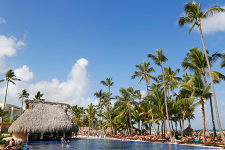 PUNTA CANA, DOMINICAN REPUBLIC - JANUARY 1, 2015: Pool bar at  Royalton All-inclusive Resort and Casino located at the Bavaro beach in Punta Canaのeditorial素材